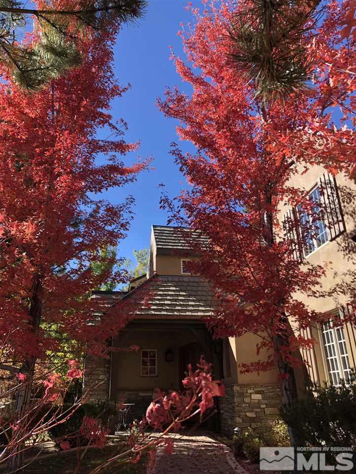 6365 Wetzel Court, Unit MONTRUEX 3 Reno, NV 89511 - Photo 23 of 24 a front view of a house with a tree