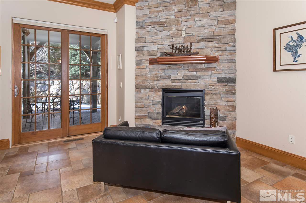 6365 Wetzel Court, Unit MONTRUEX 3 Reno, NV 89511 - Photo 6 of 24 a living room with furniture and a fireplace