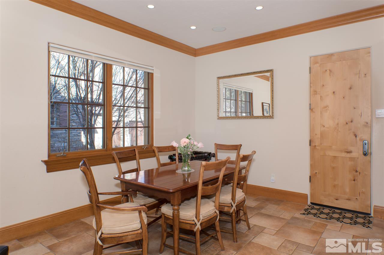 6365 Wetzel Court, Unit MONTRUEX 3 Reno, NV 89511 - Photo 7 of 24 a view of a dining room with furniture and a window