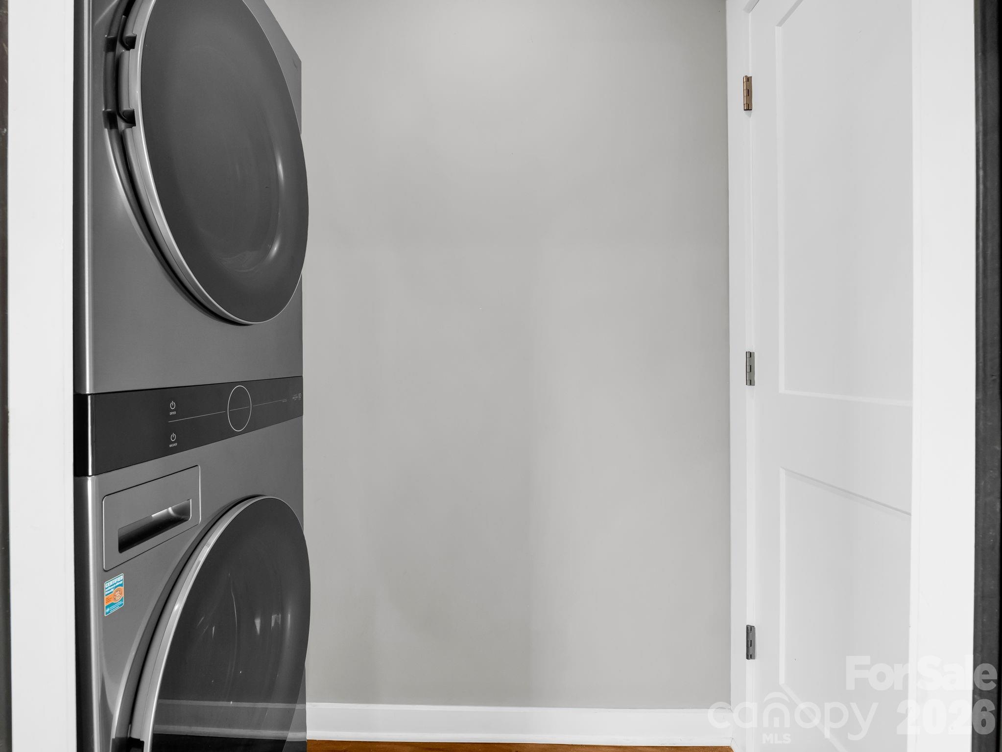 9 East Citra Street Arden, NC 28704 - Photo 22 of 28 a close view of a utility room with dryer and washer