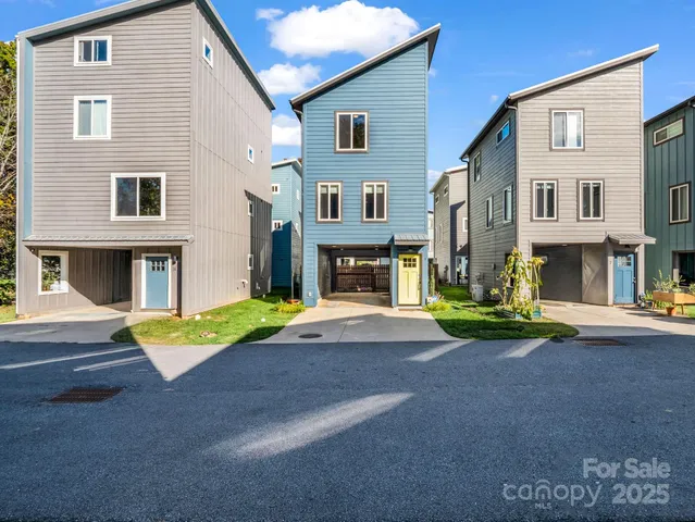 a front view of a house with yard