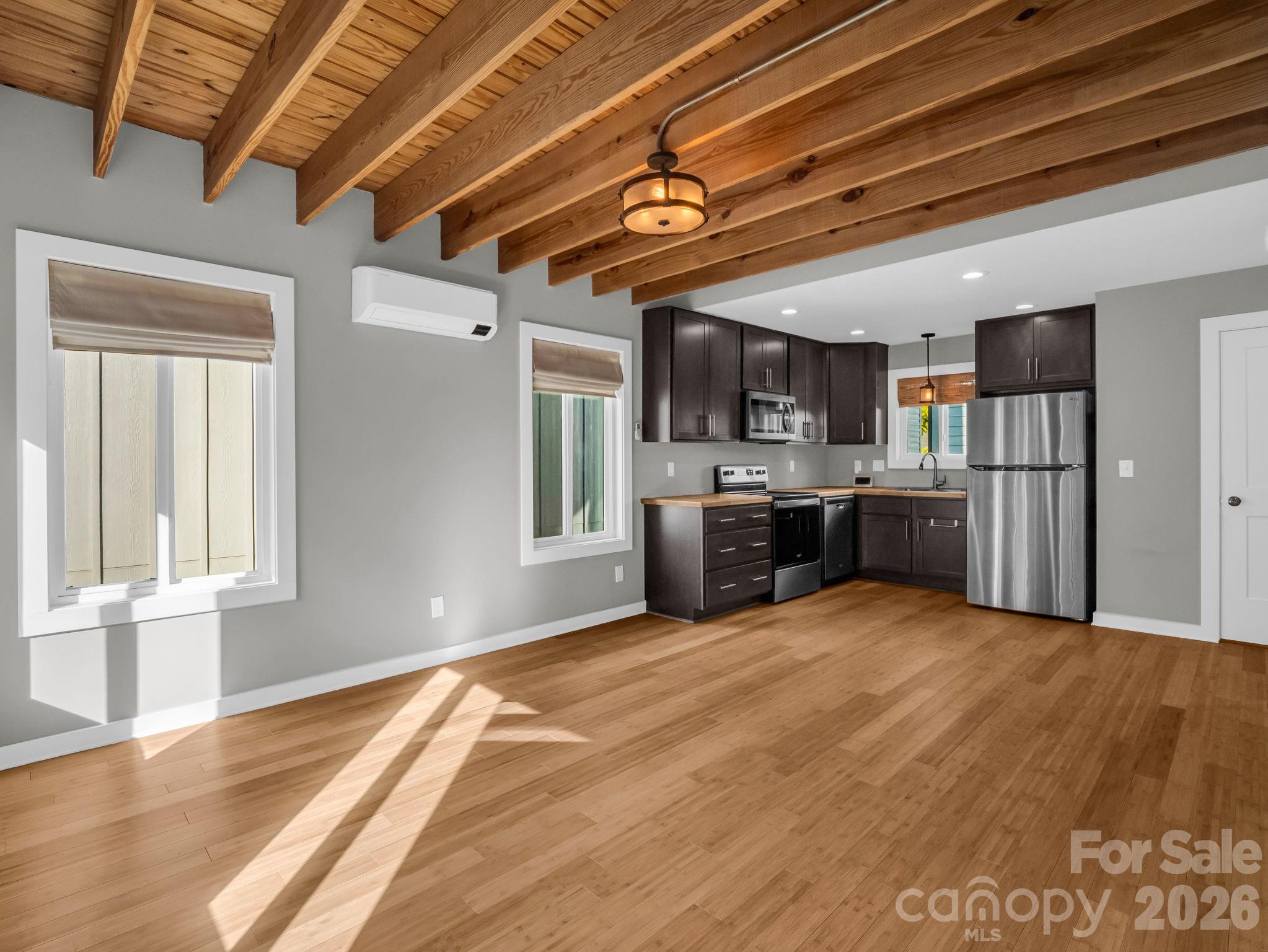 9 East Citra Street Arden, NC 28704 - Photo 6 of 28 a view of a kitchen with a sink and cabinets