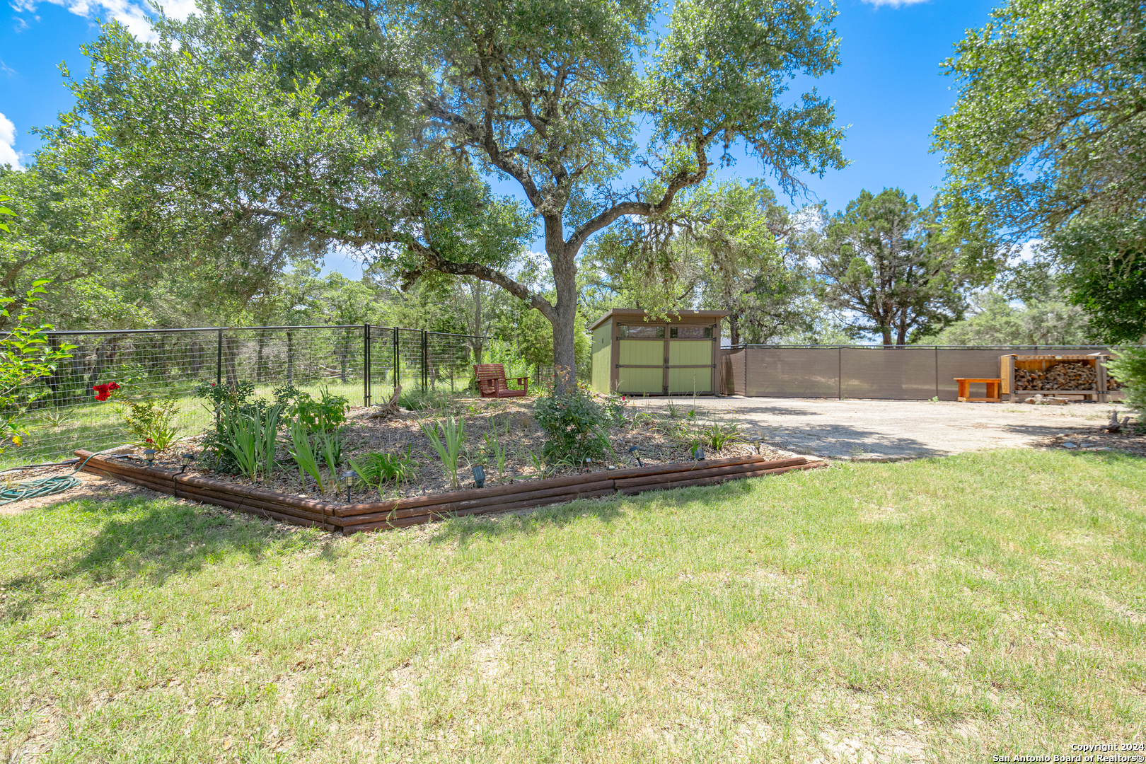 924 Rhinestone Canyon Lake, TX 78133 - Photo 38 of 41 a view of a swimming pool with a patio