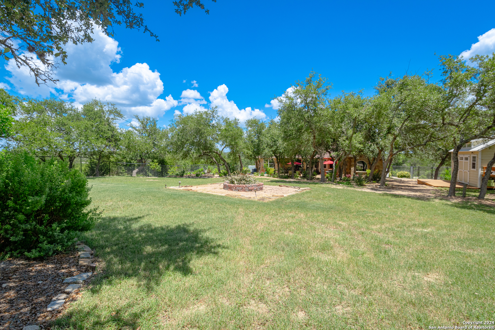924 Rhinestone Canyon Lake, TX 78133 - Photo 39 of 41 a view of swimming pool with a yard