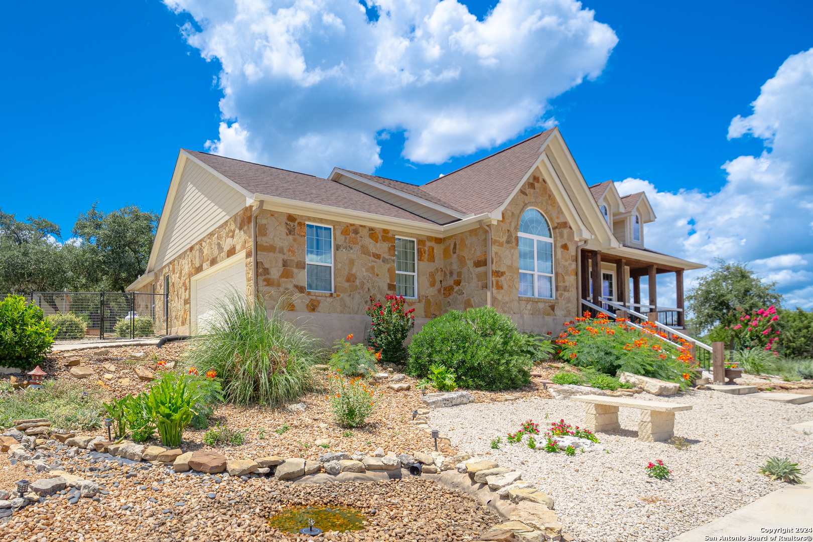 924 Rhinestone Canyon Lake, TX 78133 - Photo 40 of 41 a front view of house with yard