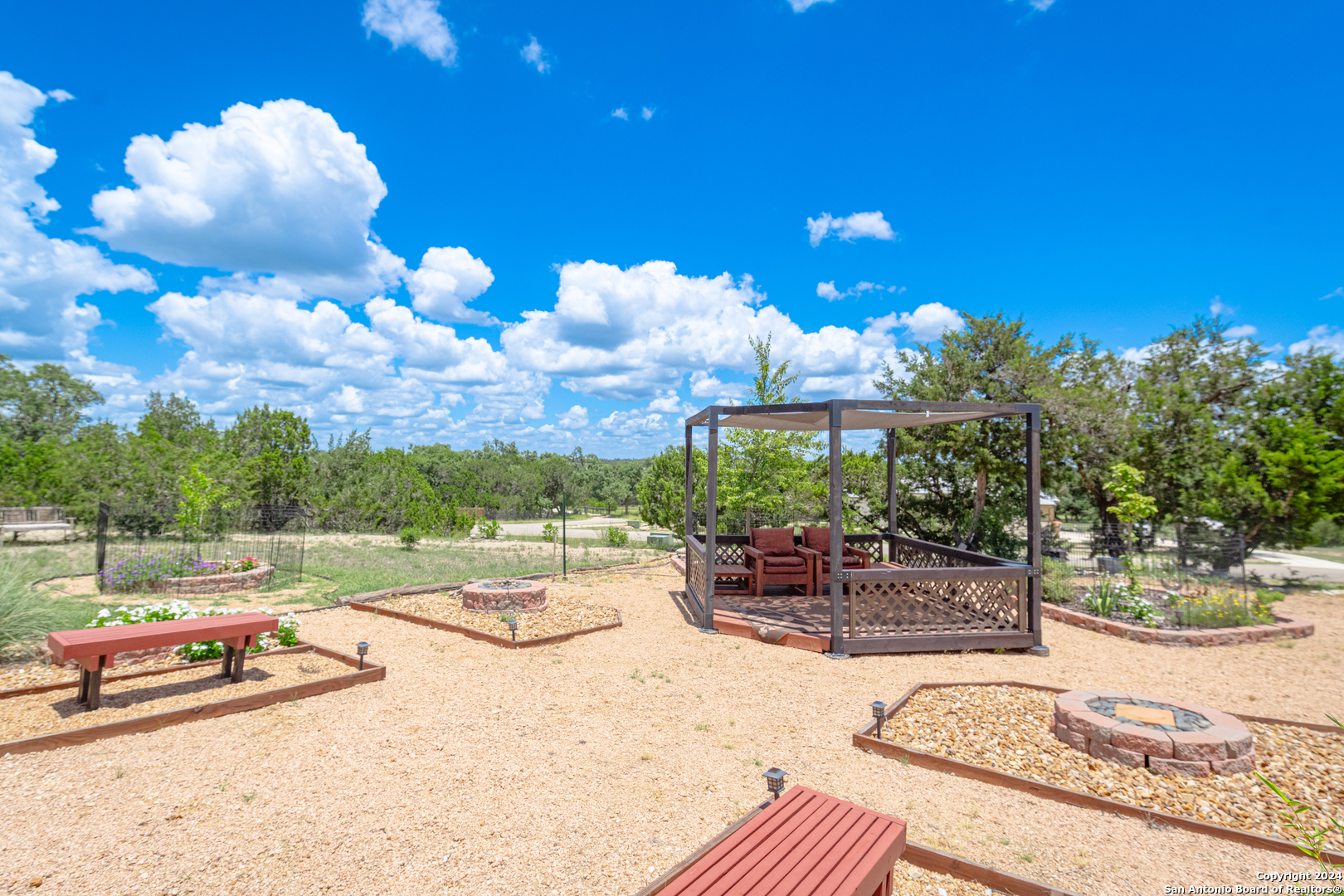 924 Rhinestone Canyon Lake, TX 78133 - Photo 5 of 41 a view of a backyard