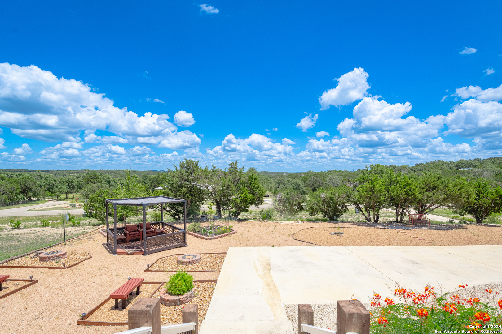 924 Rhinestone Canyon Lake, TX 78133 - Photo 6 of 41 a view of swimming pool with outdoor seating and city view