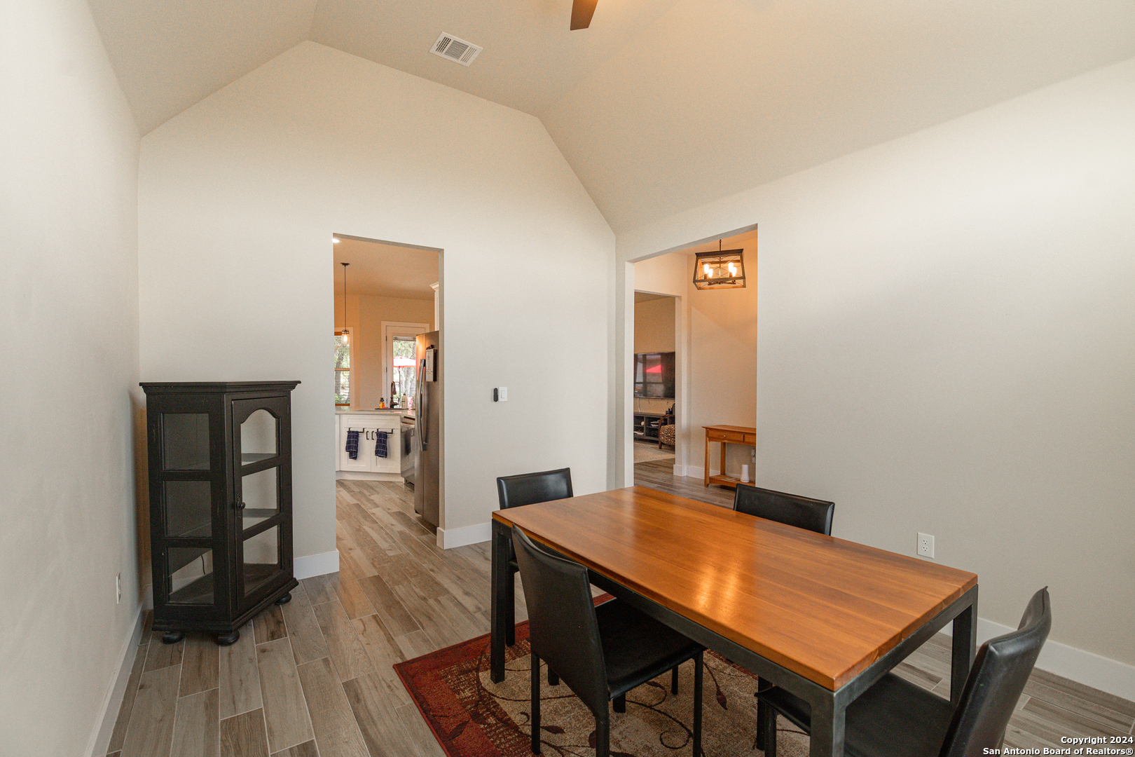 924 Rhinestone Canyon Lake, TX 78133 - Photo 8 of 41 a view of a workspace with furniture and wooden floor