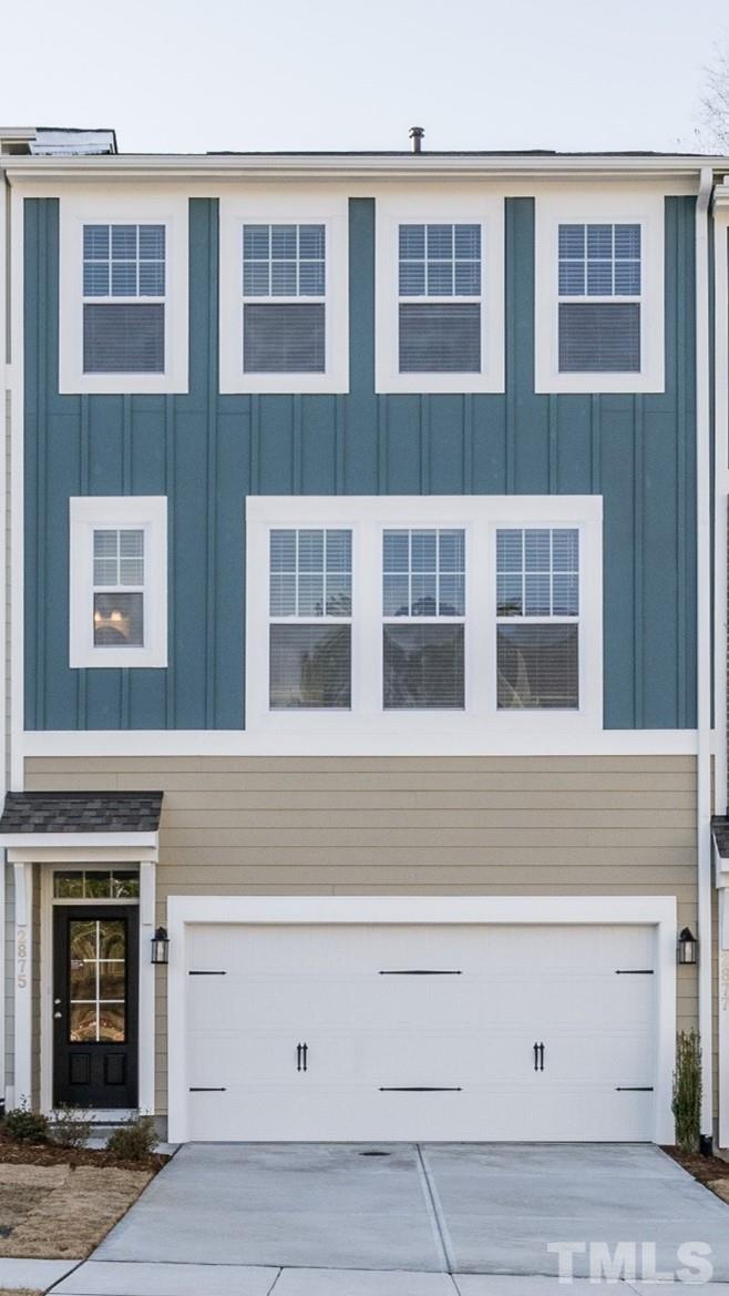 2219 Grants Pass Station, Unit 422 Apex, NC 27502 - Photo 1 of 43 a building view with a outdoor space