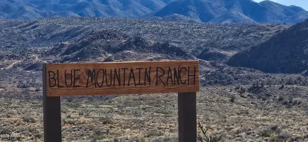 a sign broad on the side of a road