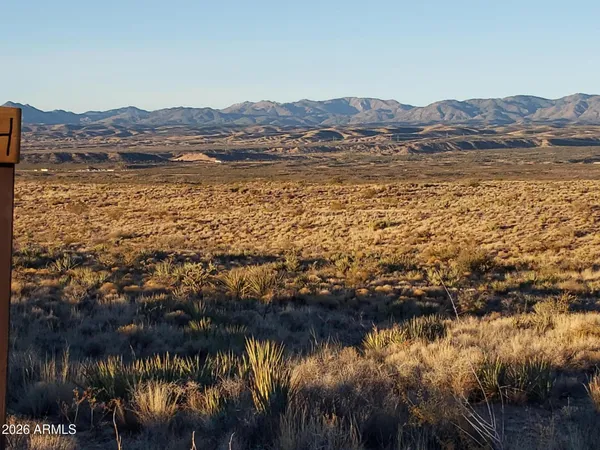 a view of lake and mountain
