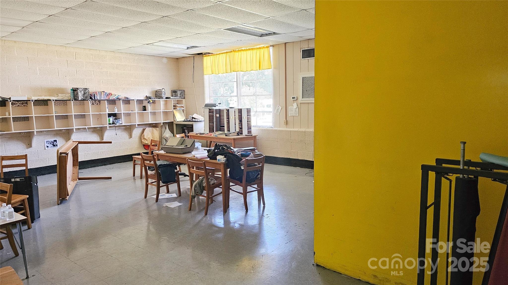 900 Patriot Street Dillon, SC 29536 - Photo 22 of 42 a dining room with furniture and wooden floor