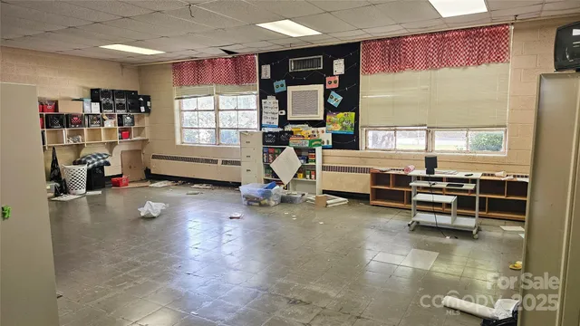 a outdoor dining space with furniture and wooden floor