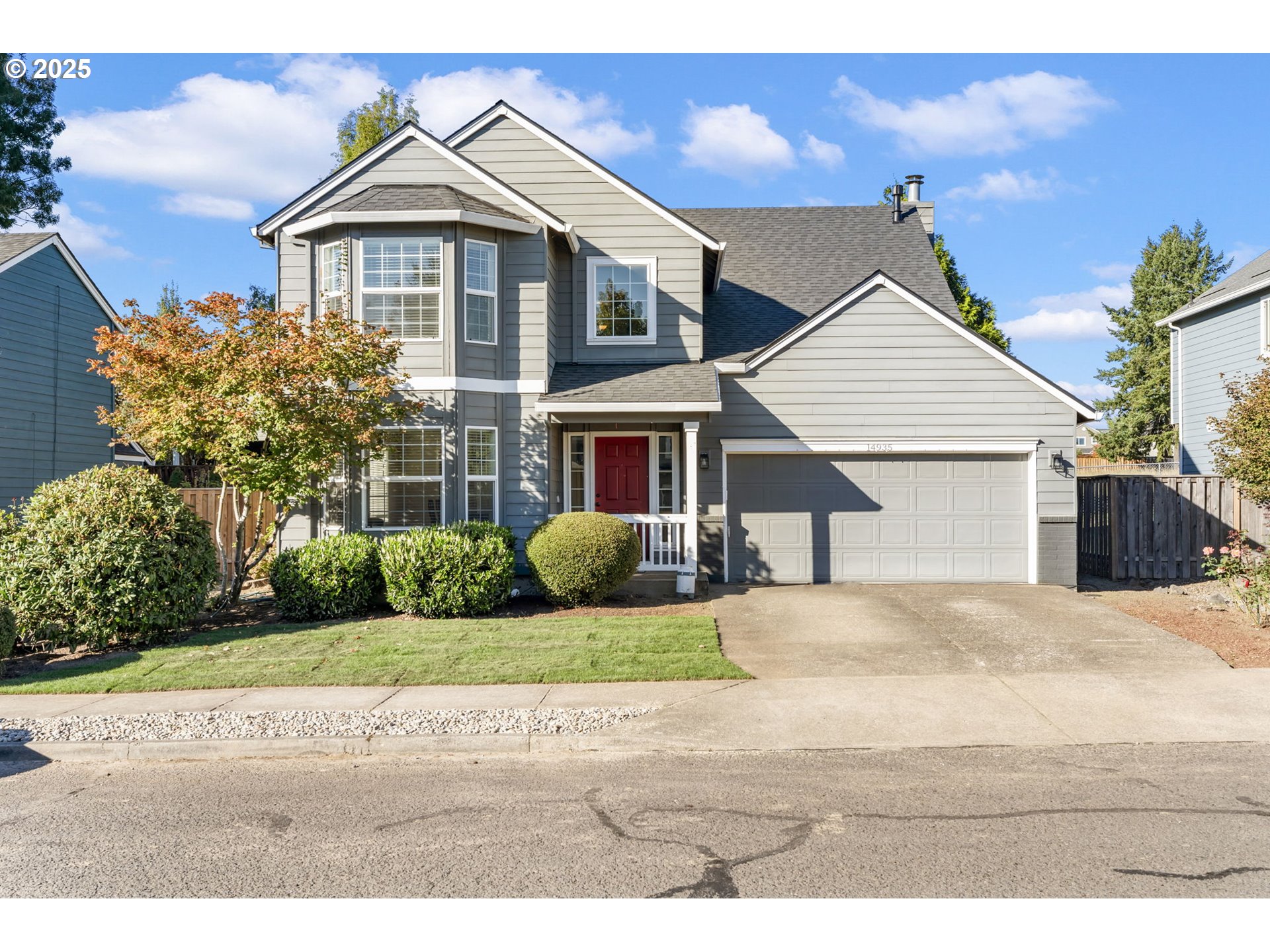 a view of a yard in front of a house