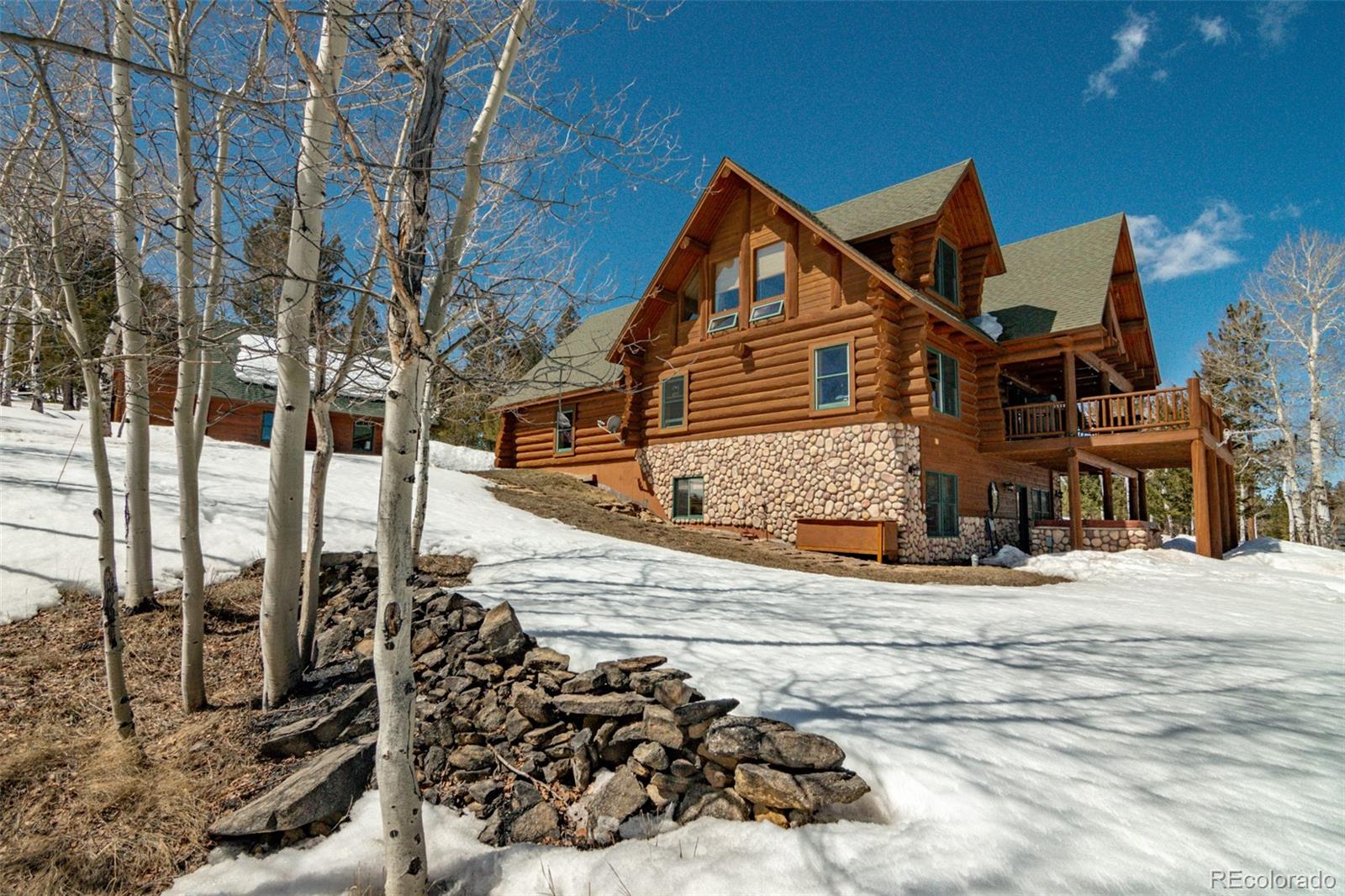 2120 Blacksmith Road Hartsel, CO 80449 - Photo 46 of 50 a front view of a house with a outdoor space