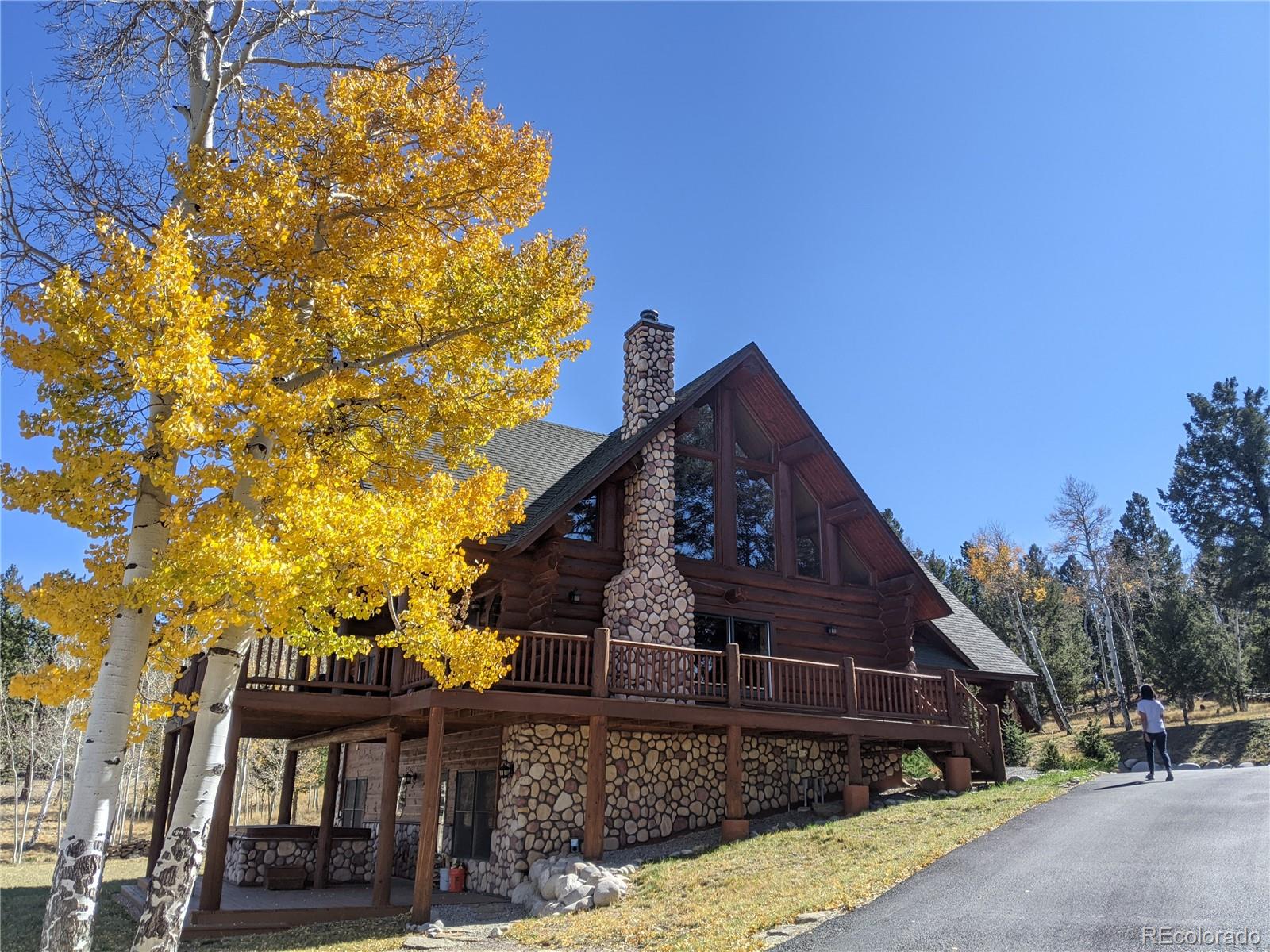 2120 Blacksmith Road Hartsel, CO 80449 - Photo 5 of 50 a front view of a house with a yard
