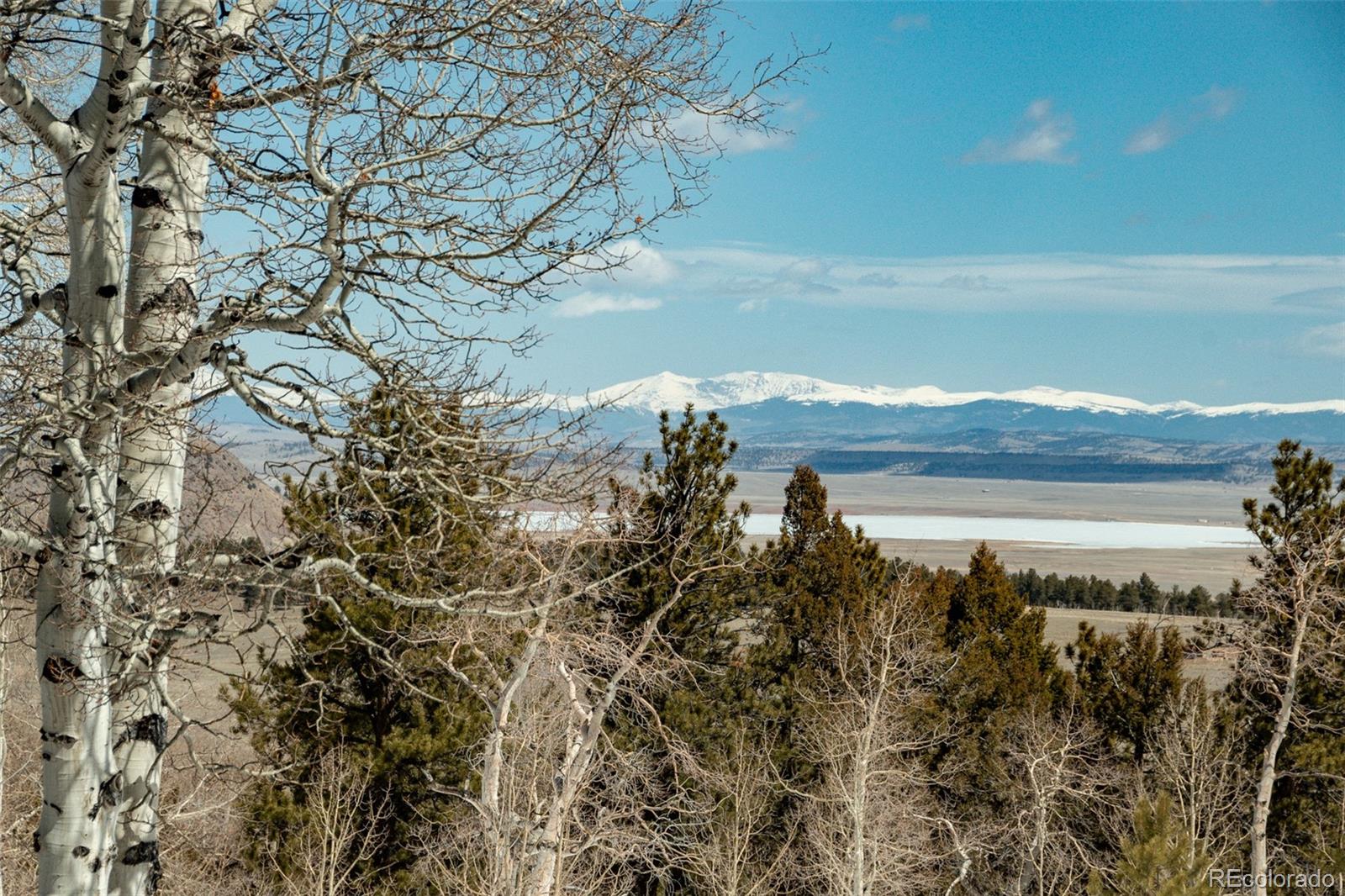 2120 Blacksmith Road Hartsel, CO 80449 - Photo 7 of 50 a view of a lake from a yard