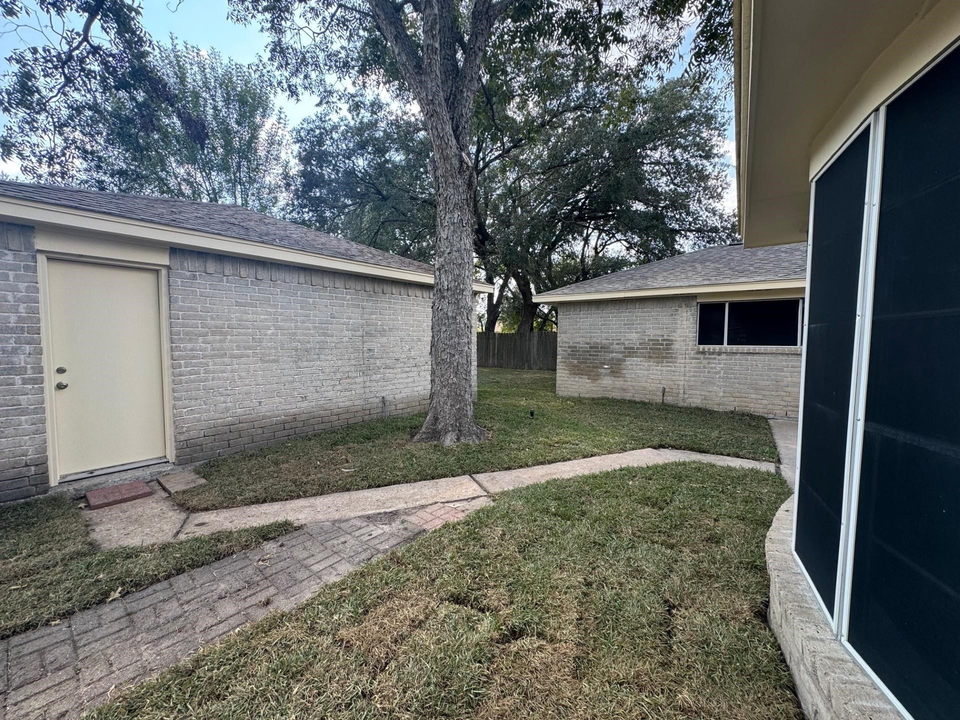 13703 Cologne Drive Houston, TX 77065 - Photo 29 of 32 a backyard of a house
