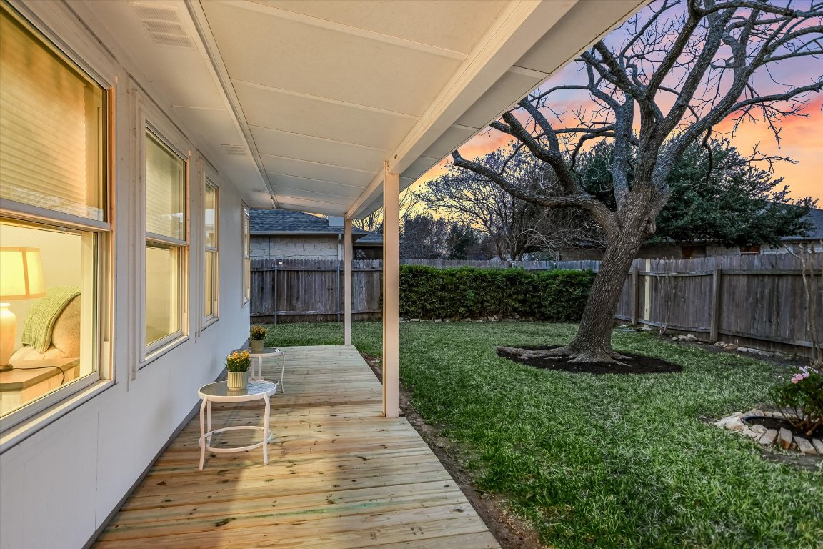 1312 Pigeon View Street Round Rock, TX 78665 - Photo 25 of 30 a backyard of a house with lots of green space