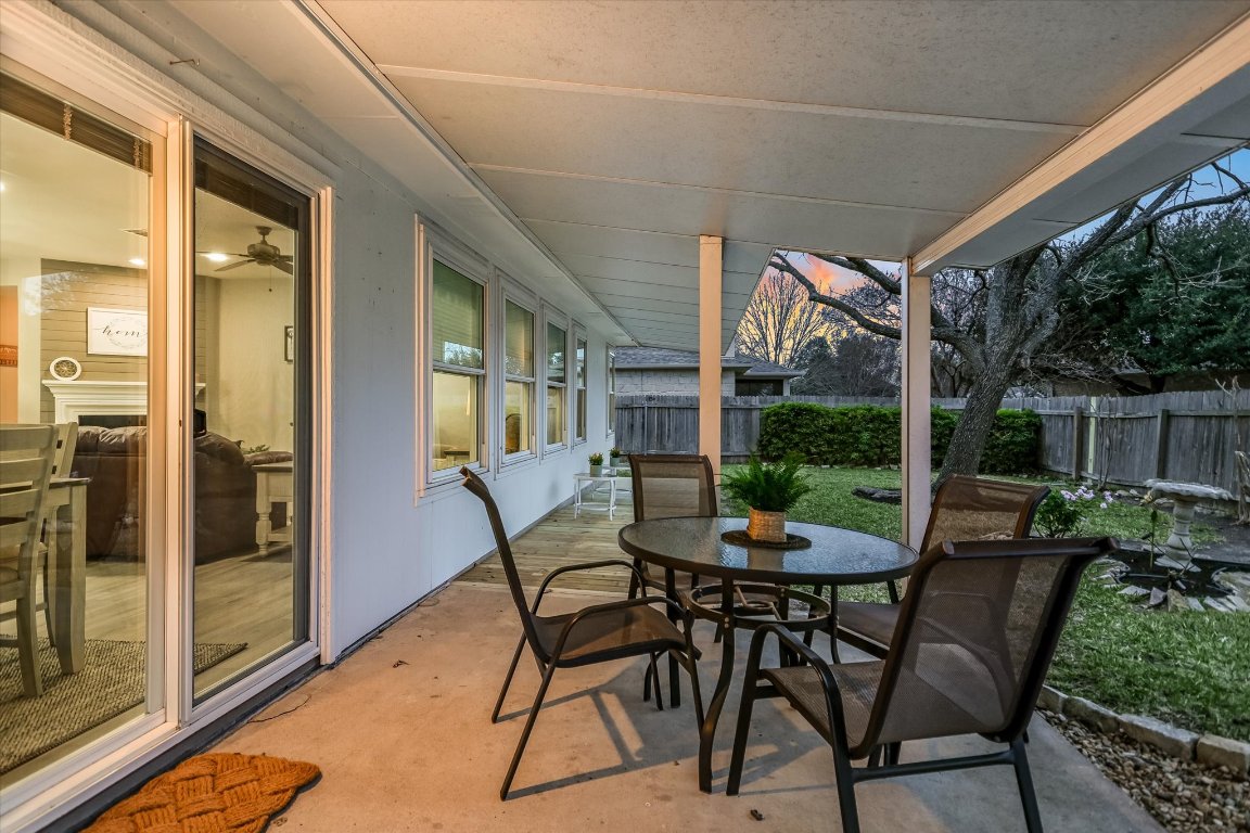 1312 Pigeon View Street Round Rock, TX 78665 - Photo 26 of 30 a view of a patio with furniture and a yard