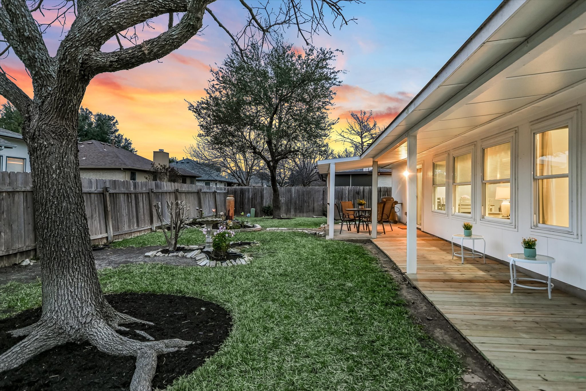 1312 Pigeon View Street Round Rock, TX 78665 - Photo 27 of 30 Yard at dusk with a fenced backyard