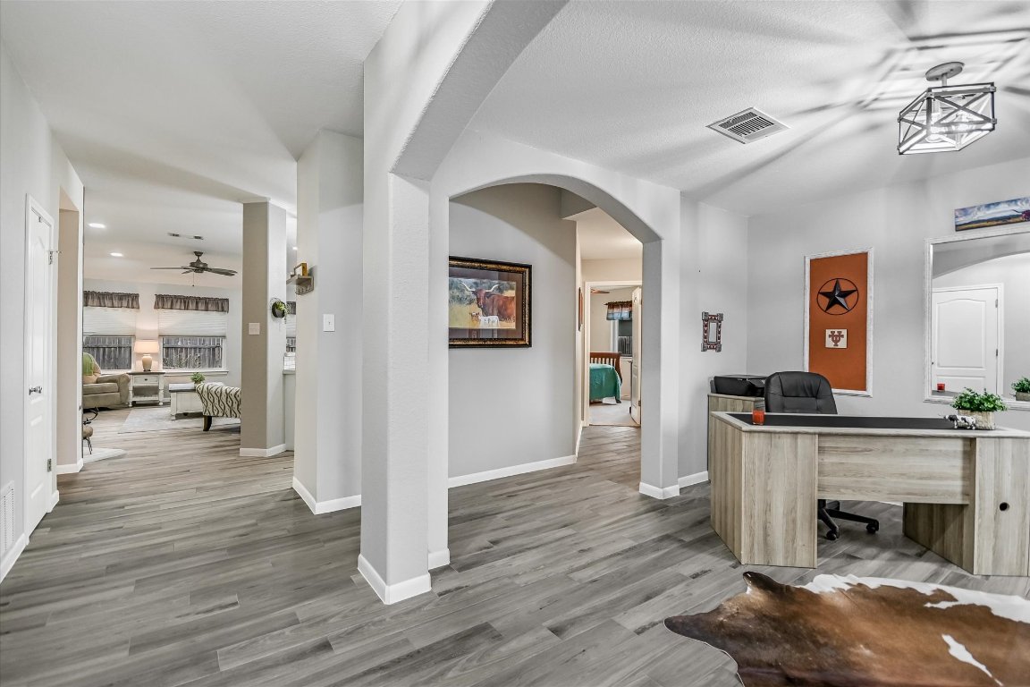 1312 Pigeon View Street Round Rock, TX 78665 - Photo 9 of 30 a view of a living room and a fireplace
