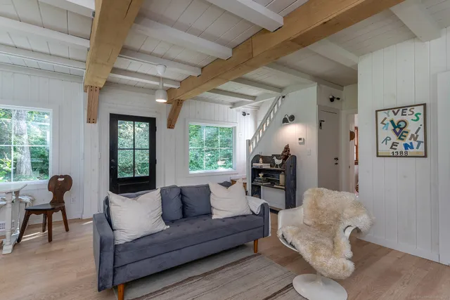 a bedroom with bed and window