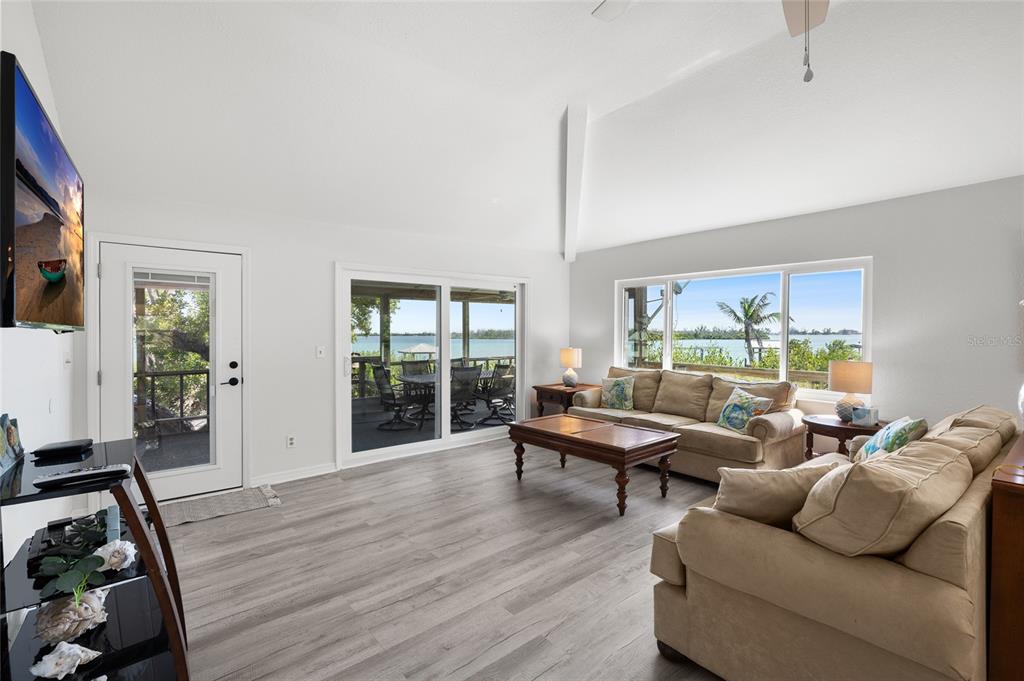 9776 Little Gasparilla Boca Grande, FL 33921 - Photo 15 of 52 a living room with furniture and wooden floor