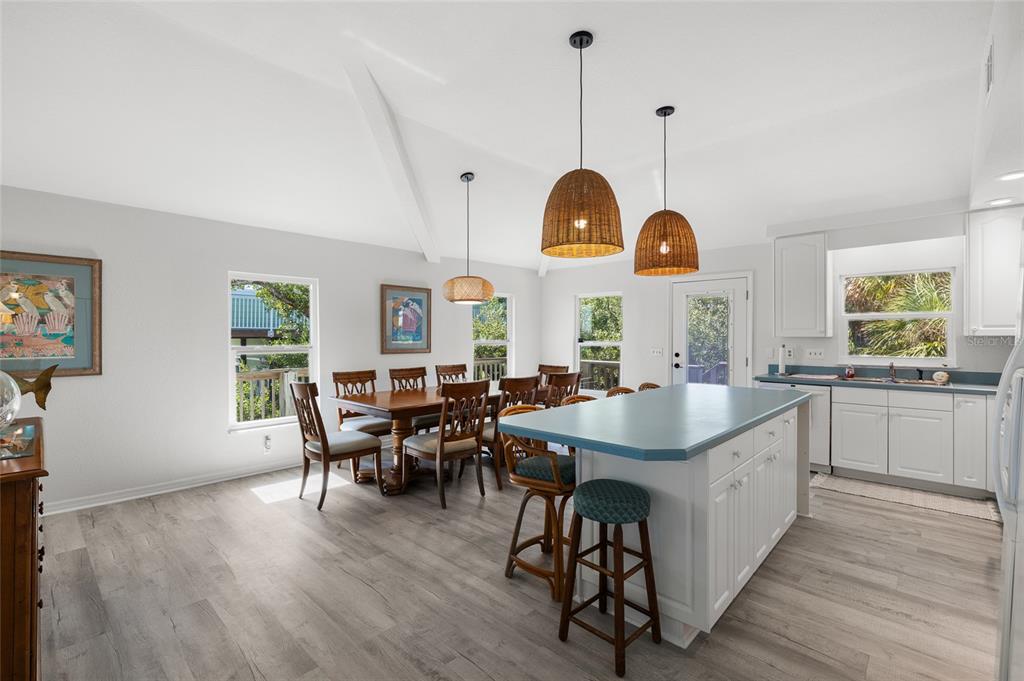 9776 Little Gasparilla Boca Grande, FL 33921 - Photo 19 of 52 a view of kitchen and dining room with wooden floor