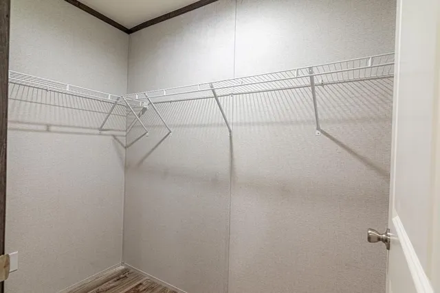 a view of a room with racks on the wall