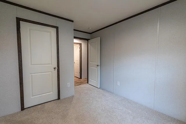 a view of hallway with closet