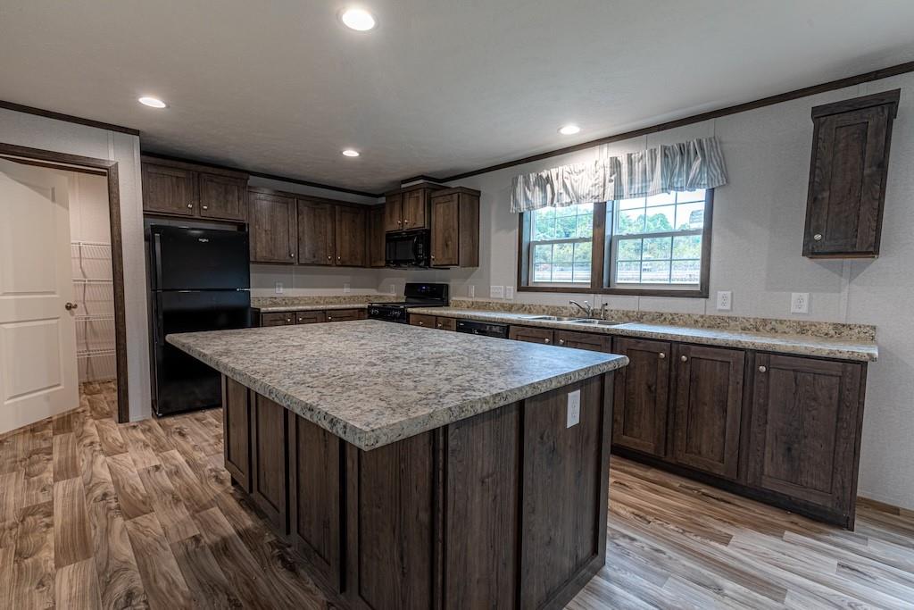 1328 Hidden Valley Road Bulger, PA 15019 - Photo 7 of 21 a kitchen with stainless steel appliances granite countertop a sink stove and refrigerator