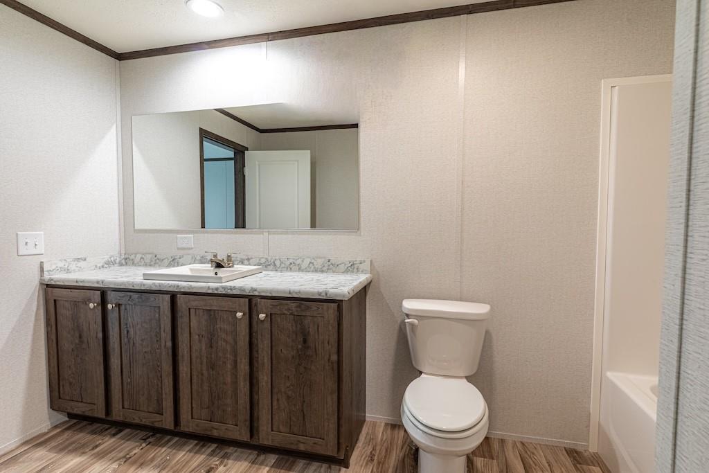 1328 Hidden Valley Road Bulger, PA 15019 - Photo 10 of 21 a bathroom with a toilet a sink and mirror