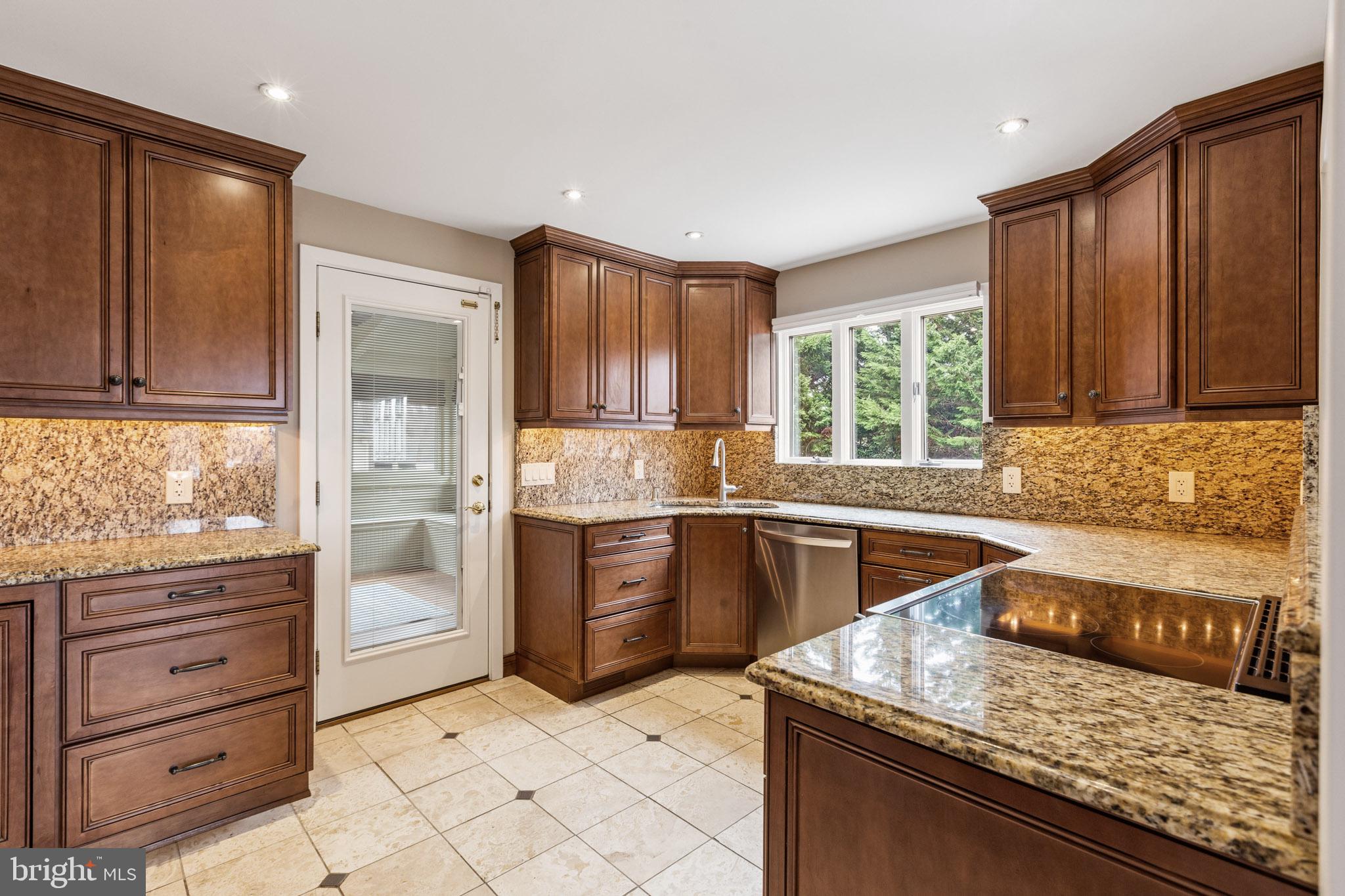 218 Lees Lane Edgewater, MD 21037 - Photo 13 of 41 Elegant kitchen with rich cabinetry.