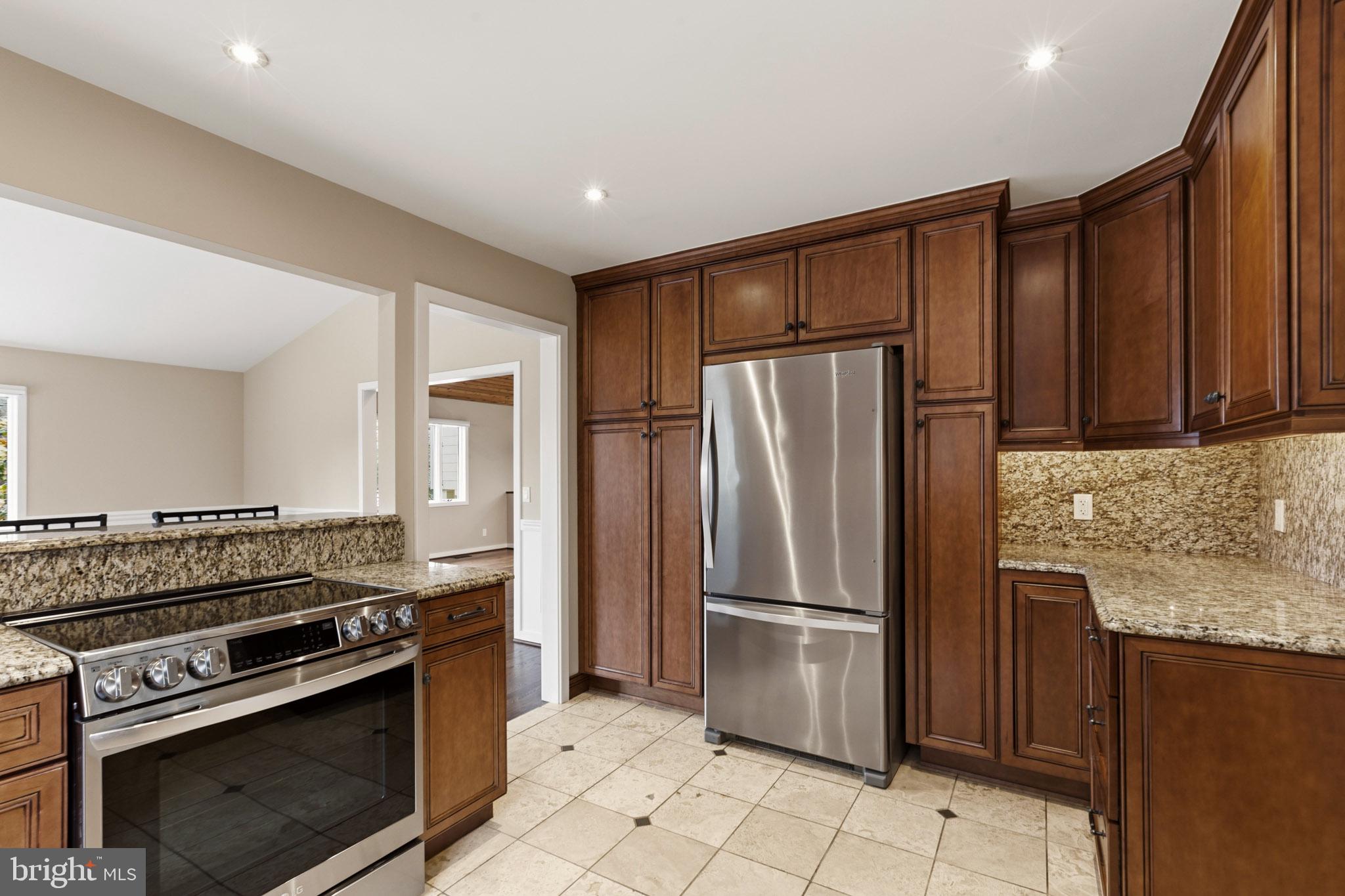 218 Lees Lane Edgewater, MD 21037 - Photo 15 of 41 Modern kitchen with rich cabinetry.
