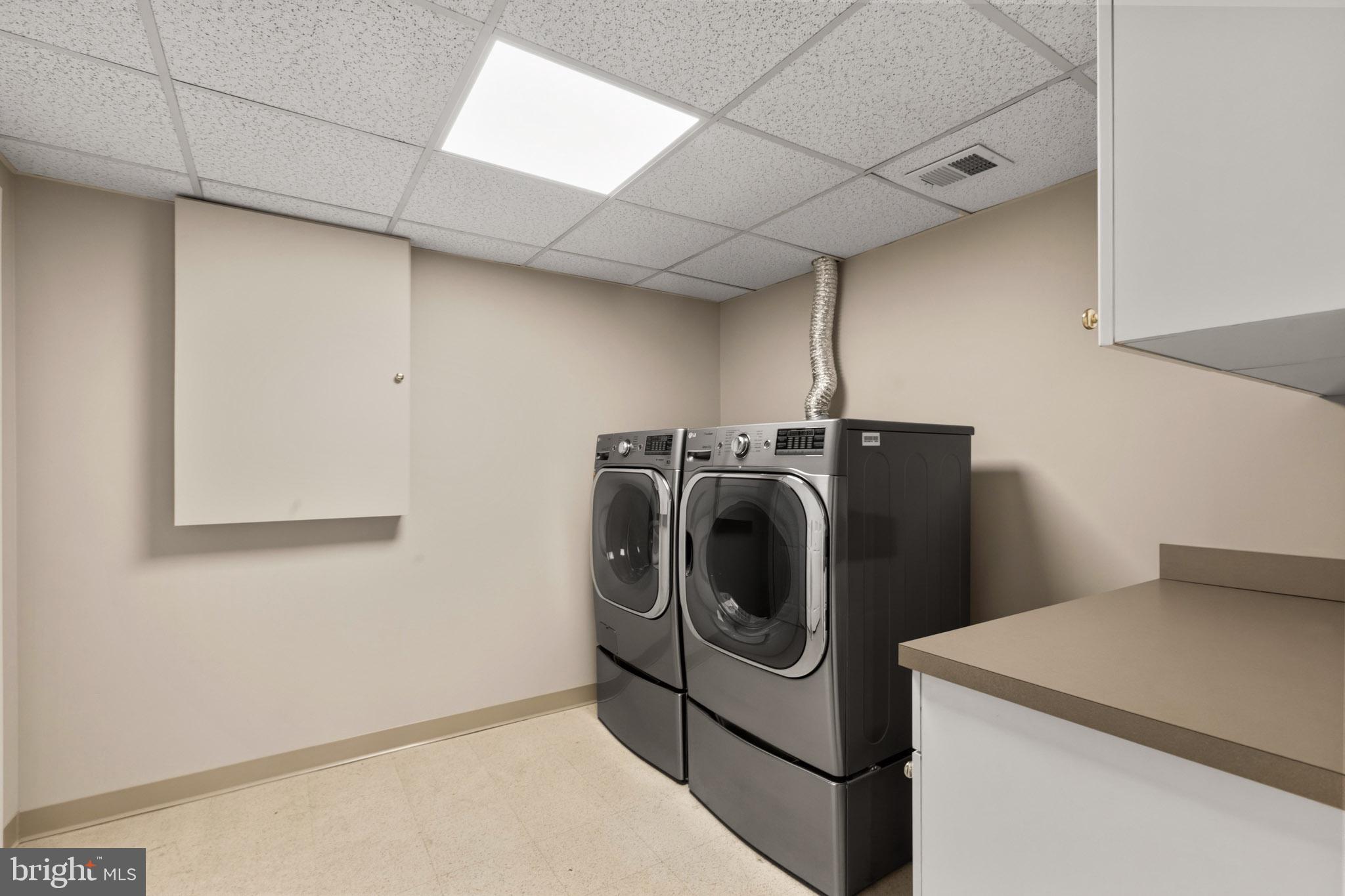 218 Lees Lane Edgewater, MD 21037 - Photo 24 of 41 Modern laundry space with sleek appliances.