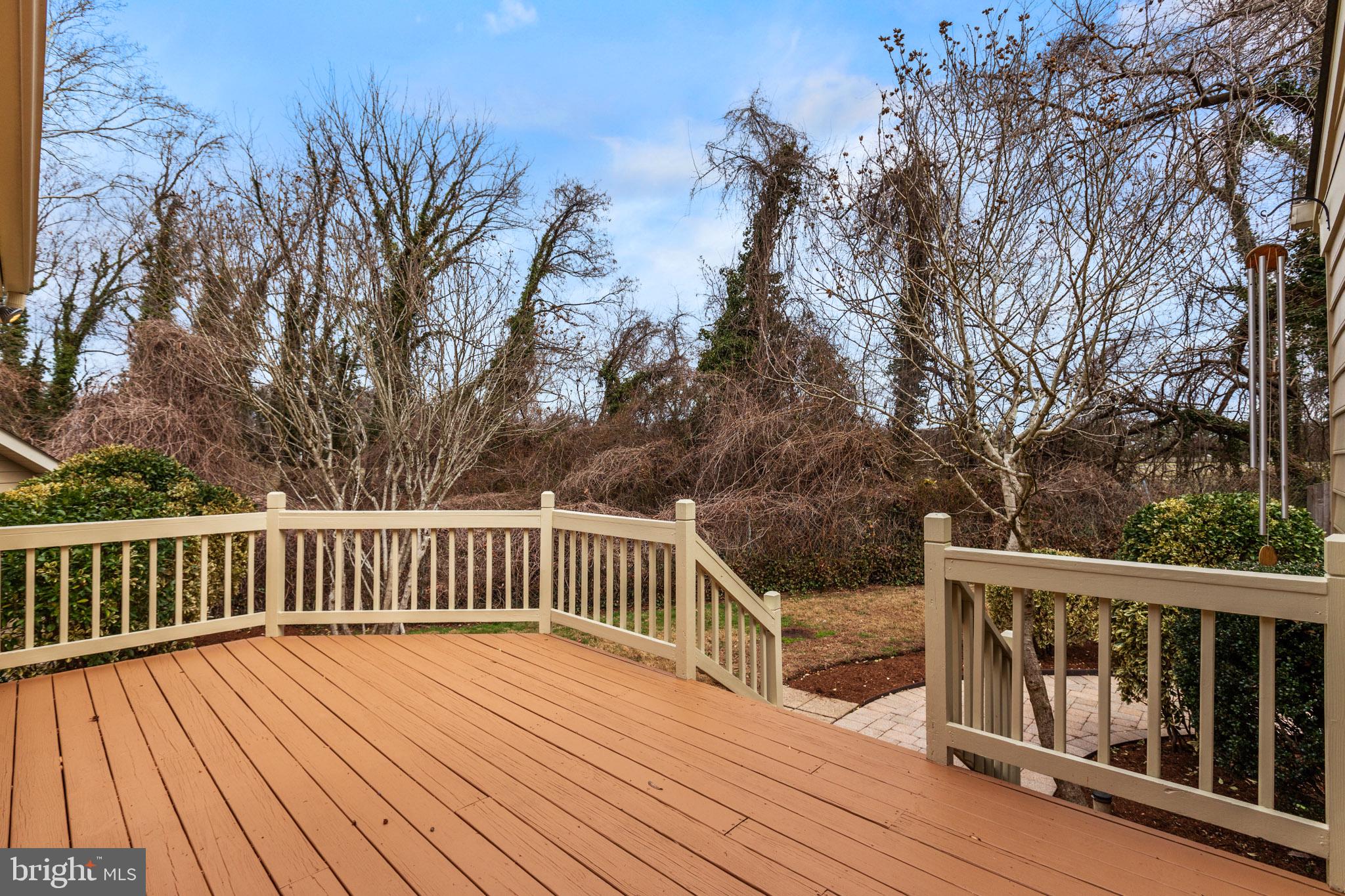 218 Lees Lane Edgewater, MD 21037 - Photo 28 of 41 Serene deck overlooking lush greenery.