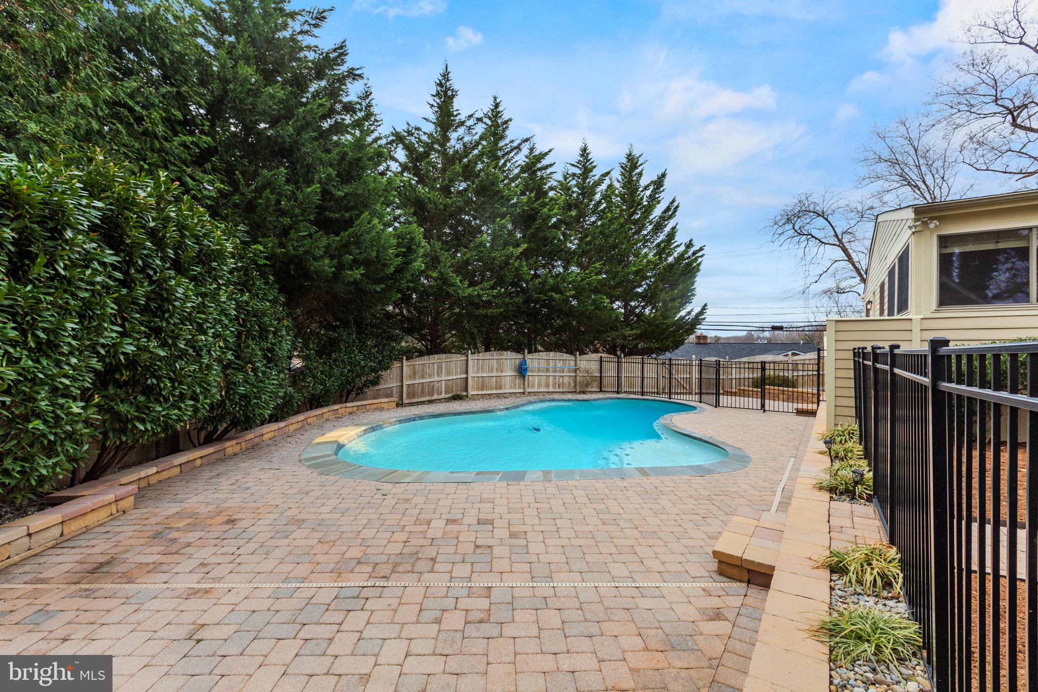 218 Lees Lane Edgewater, MD 21037 - Photo 29 of 41 Serene poolside retreat awaits you.
