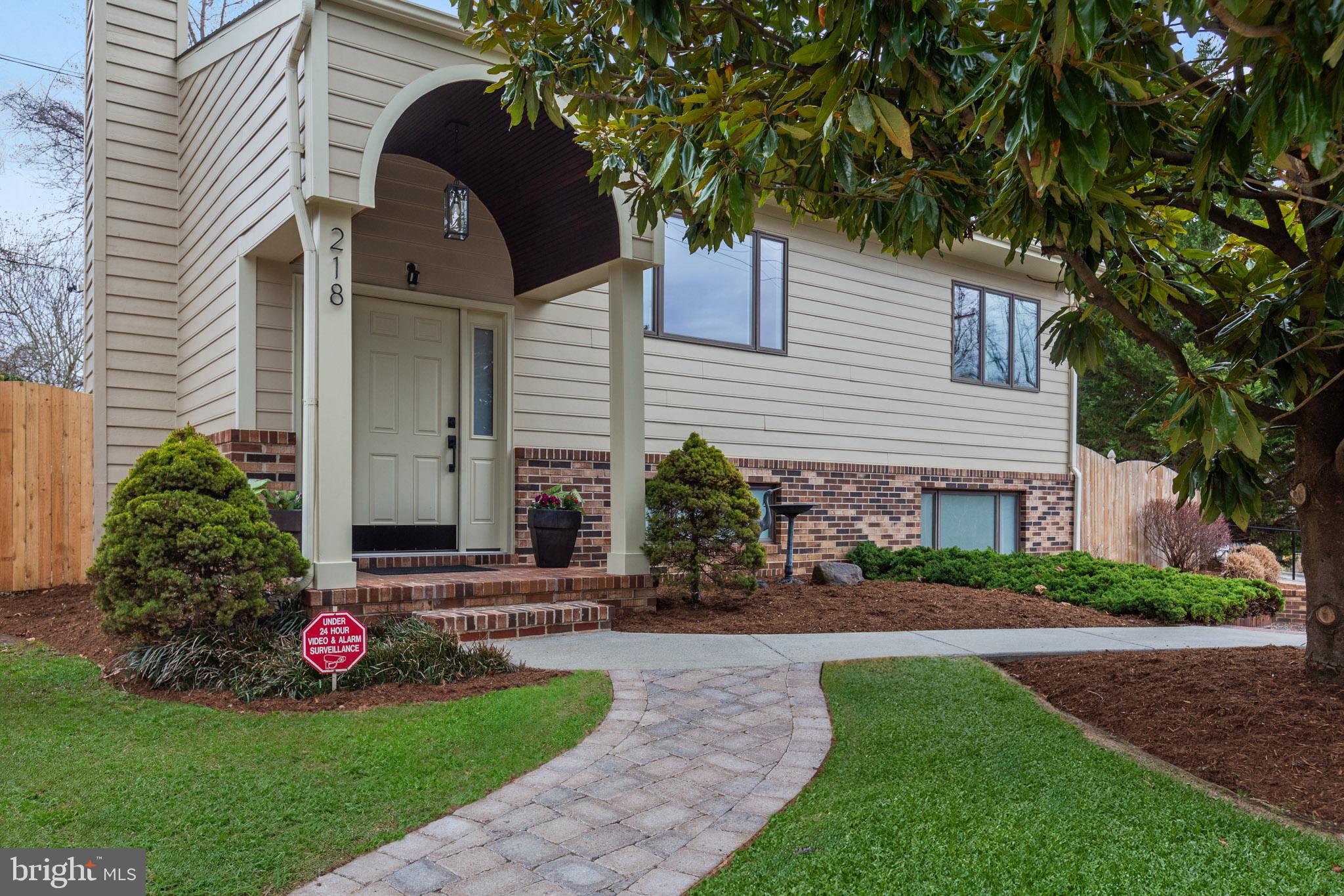 218 Lees Lane Edgewater, MD 21037 - Photo 3 of 41 Charming entrance with lush landscaping.