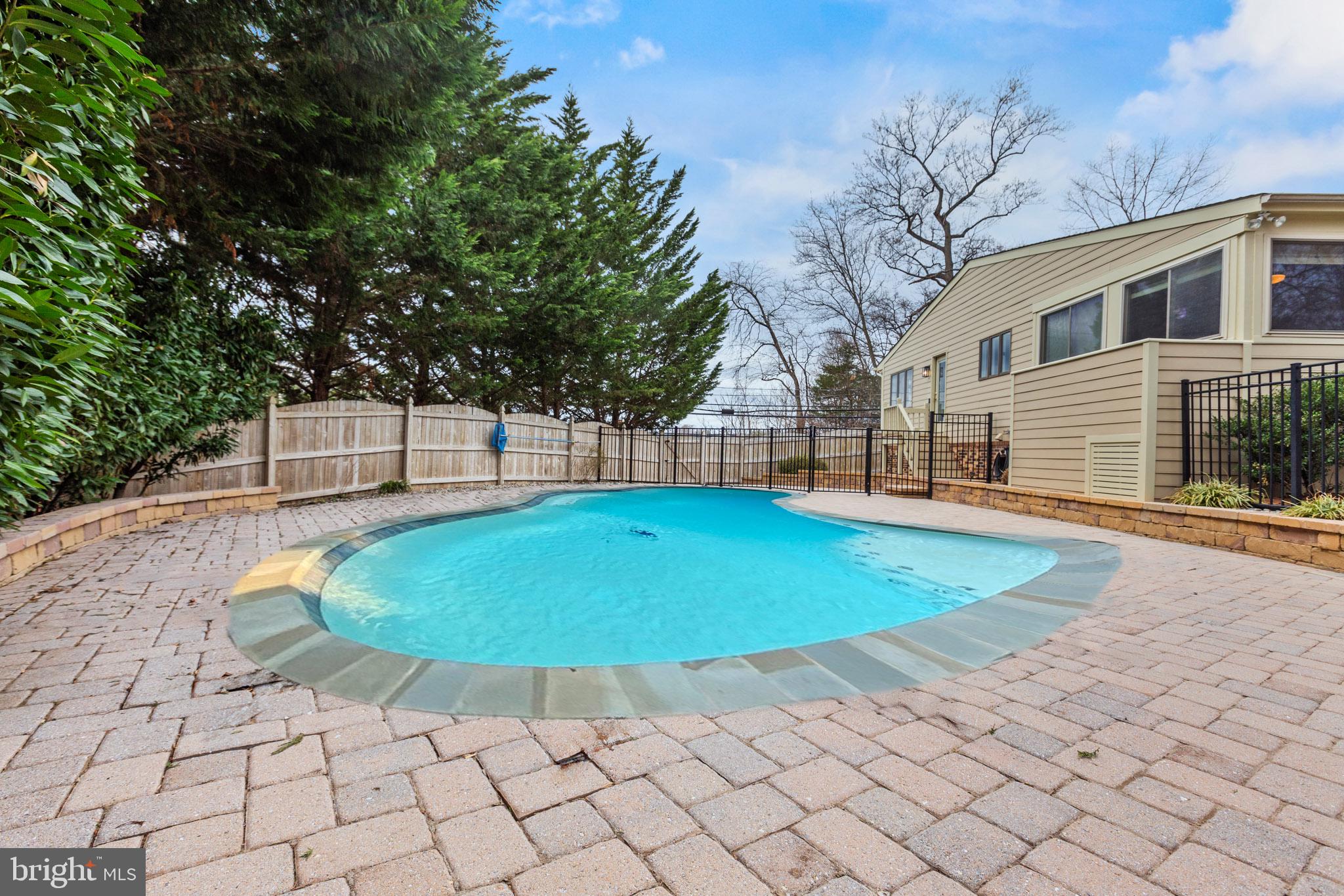 218 Lees Lane Edgewater, MD 21037 - Photo 31 of 41 Tranquil poolside retreat awaits you.