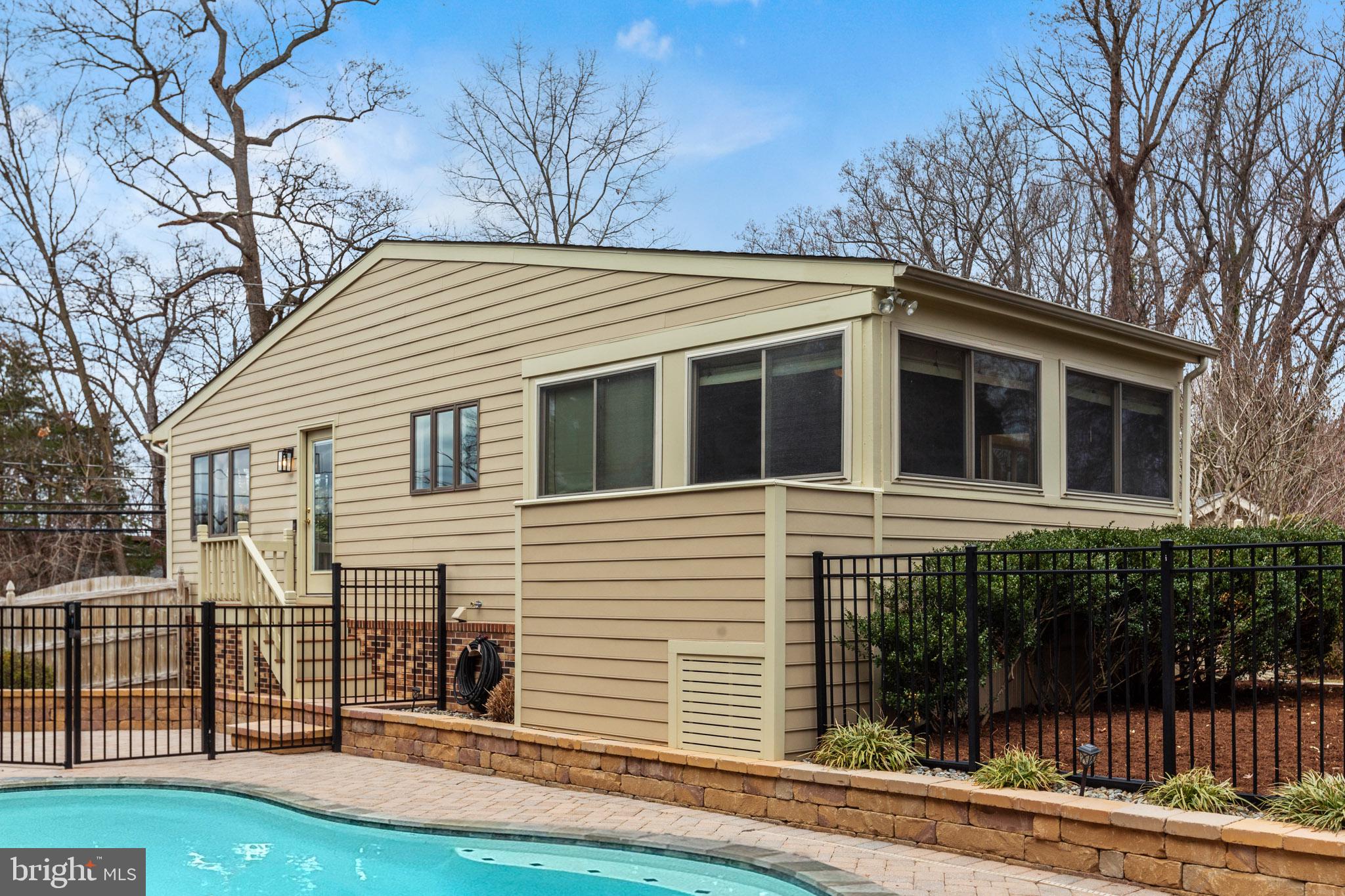 218 Lees Lane Edgewater, MD 21037 - Photo 32 of 41 Charming home by the serene poolside.