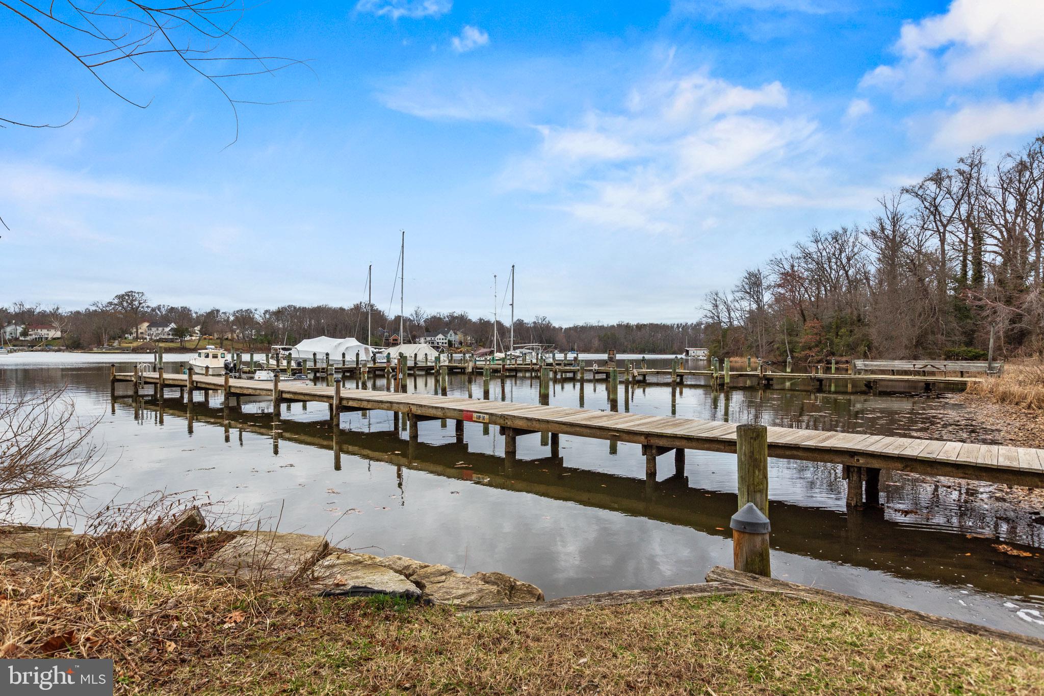 218 Lees Lane Edgewater, MD 21037 - Photo 38 of 41 Tranquil waterfront dock scene.