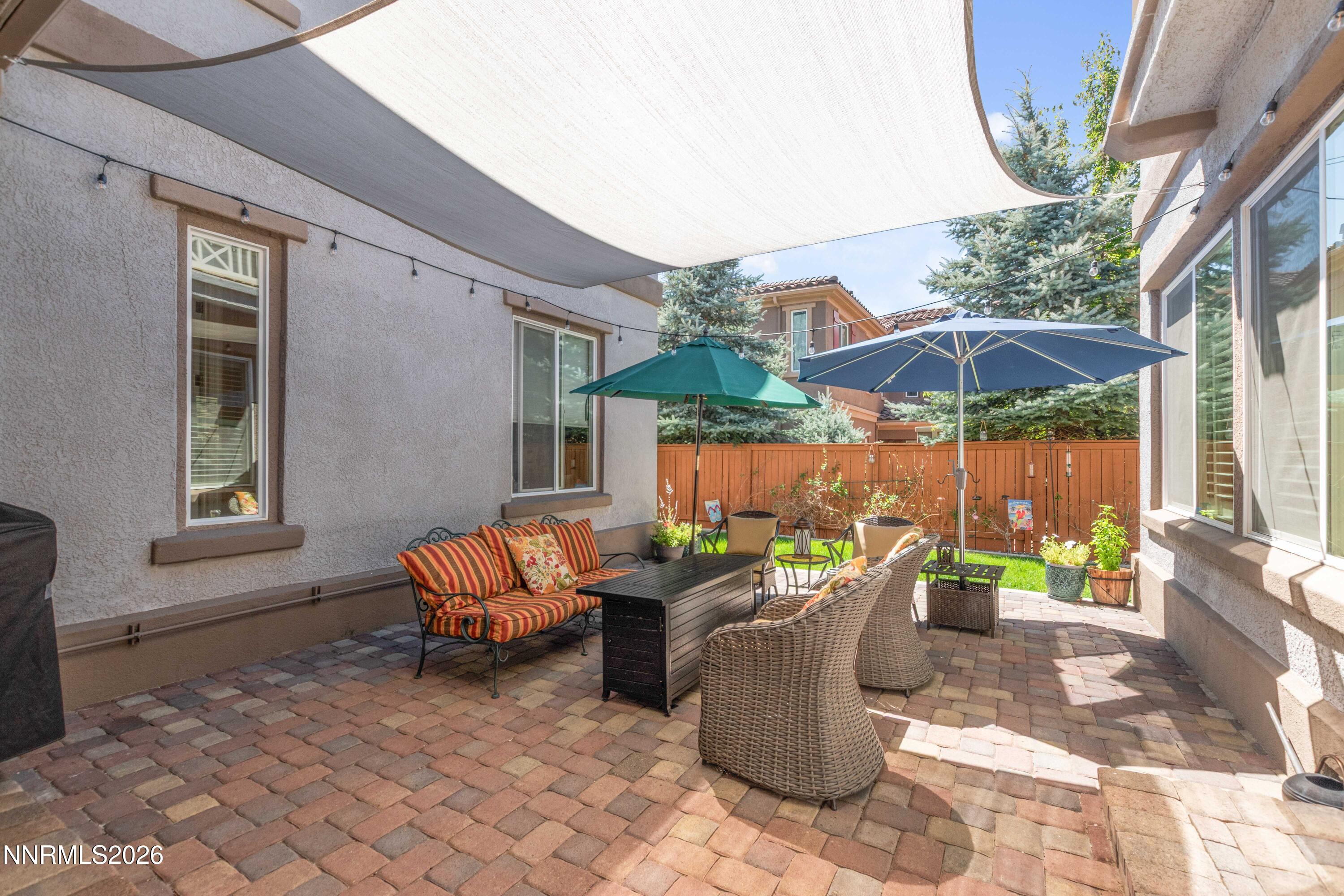2395 Ridge Field Trail Reno, NV 89523 - Photo 32 of 44 a view of a patio with chairs and tables