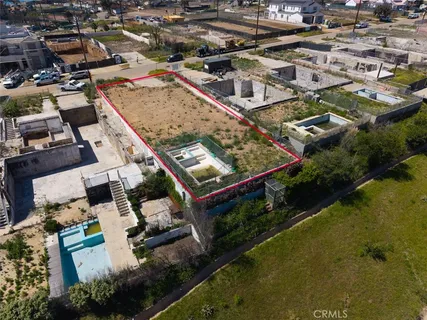 an aerial view of a city with lots of residential buildings