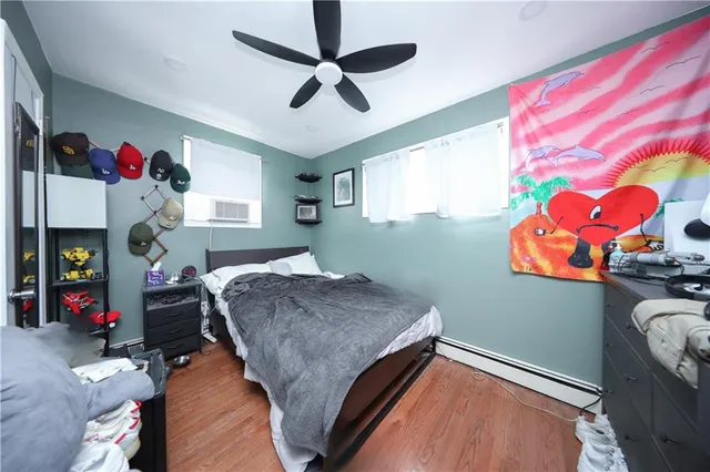 a bathroom with a toilet sink and shower