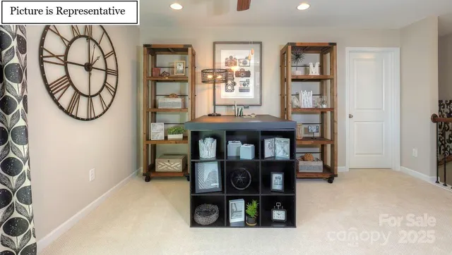 a view of a livingroom with furniture