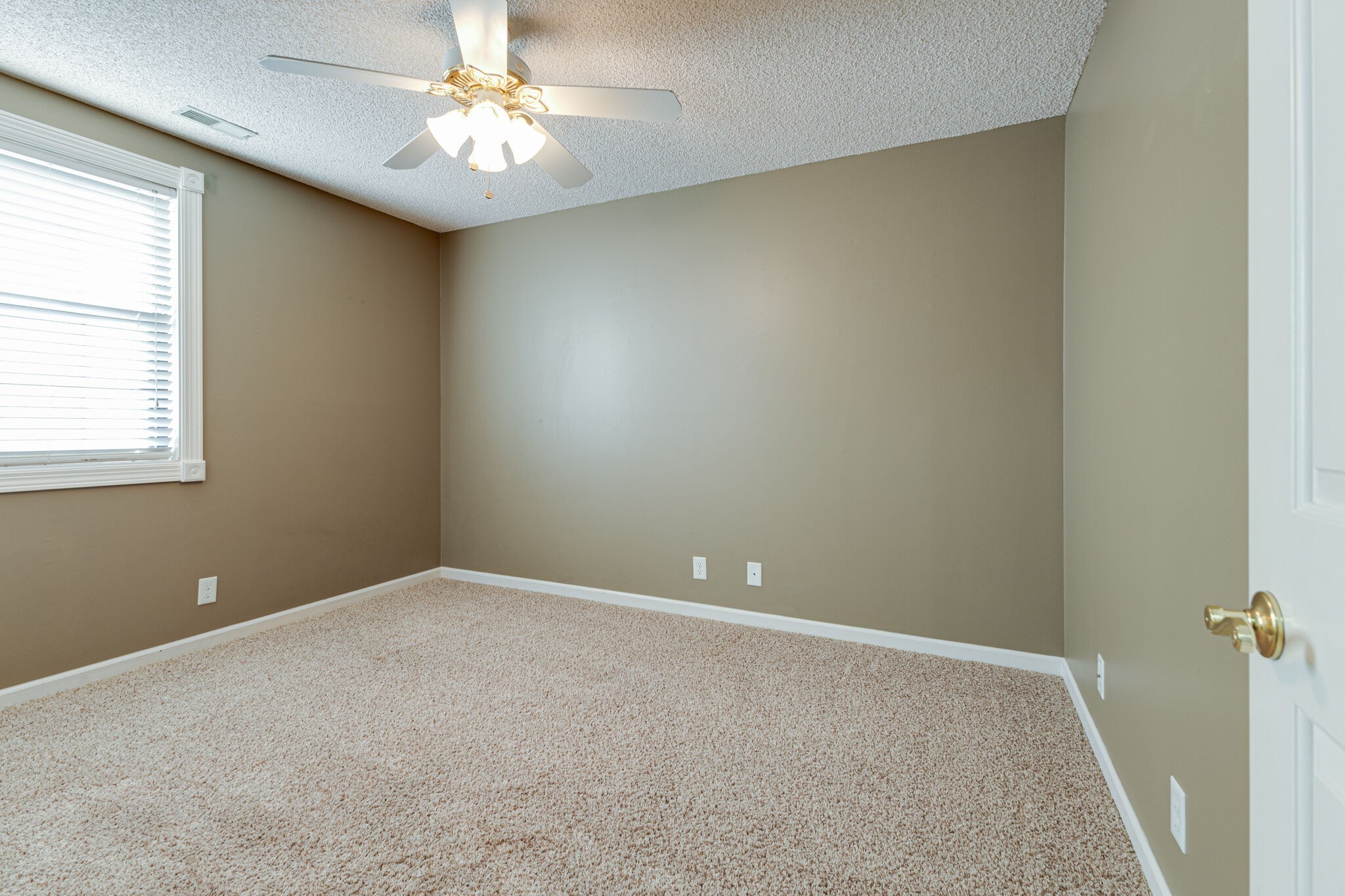 760 Fox Ridge Drive Brentwood, TN 37027 - Photo 19 of 26 an empty room with a window and a fan