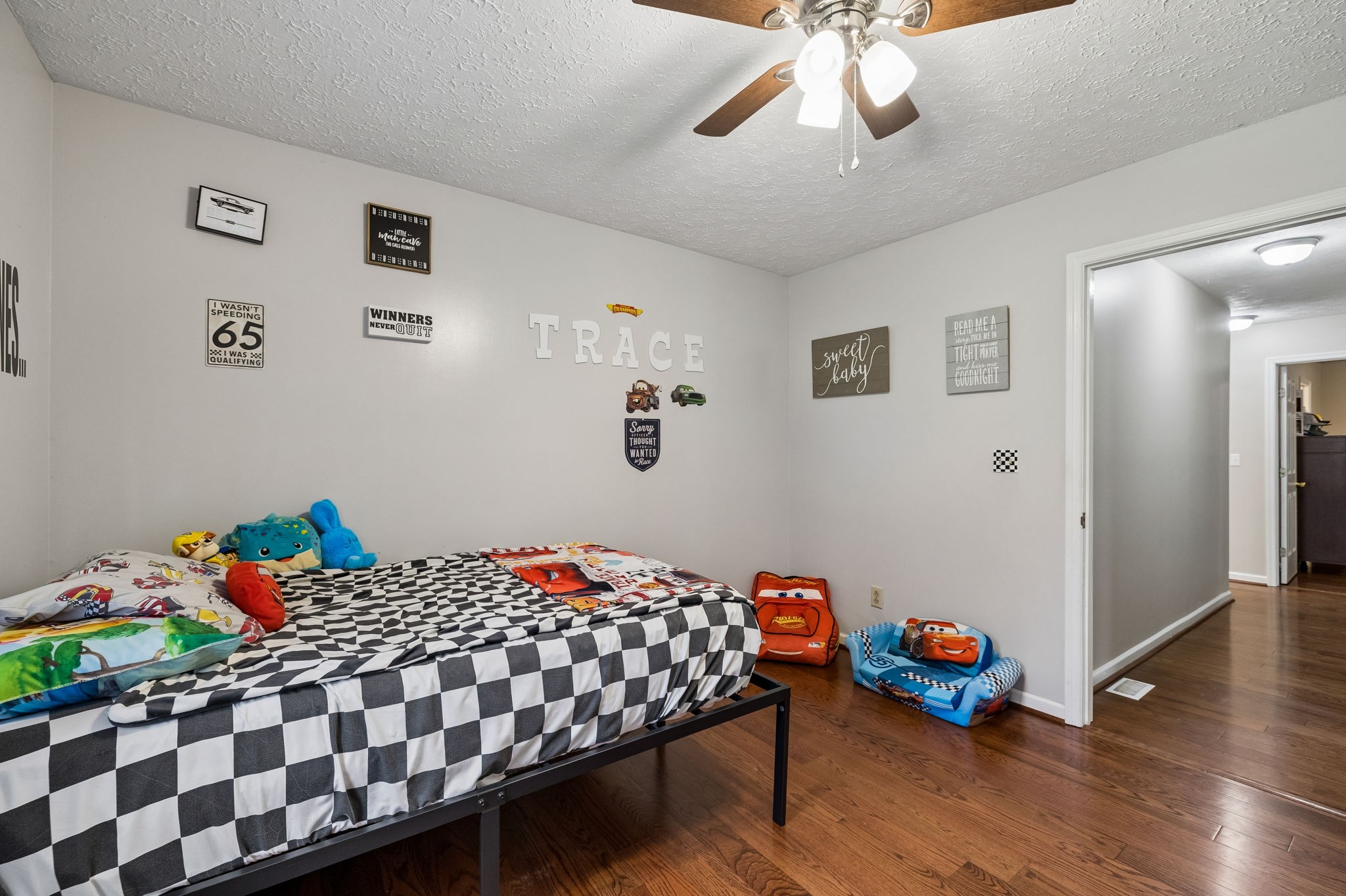 2075 Nikki Drive Springfield, TN 37172 - Photo 29 of 58 a bedroom with a bed and wooden floor