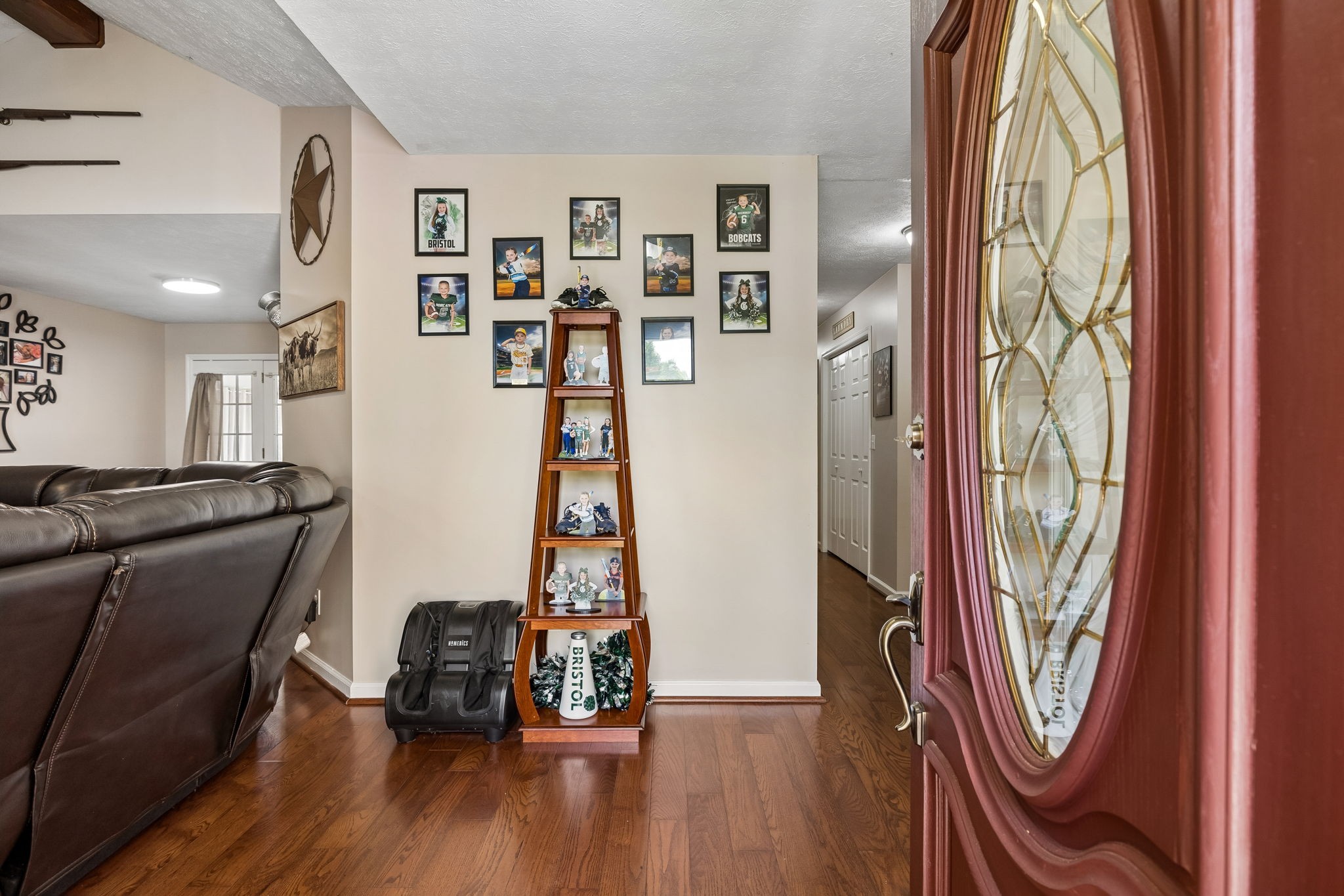 2075 Nikki Drive Springfield, TN 37172 - Photo 8 of 58 a view of a hallway with furniture and wooden floor