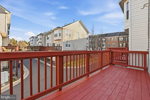 a view of a brick building from a balcony